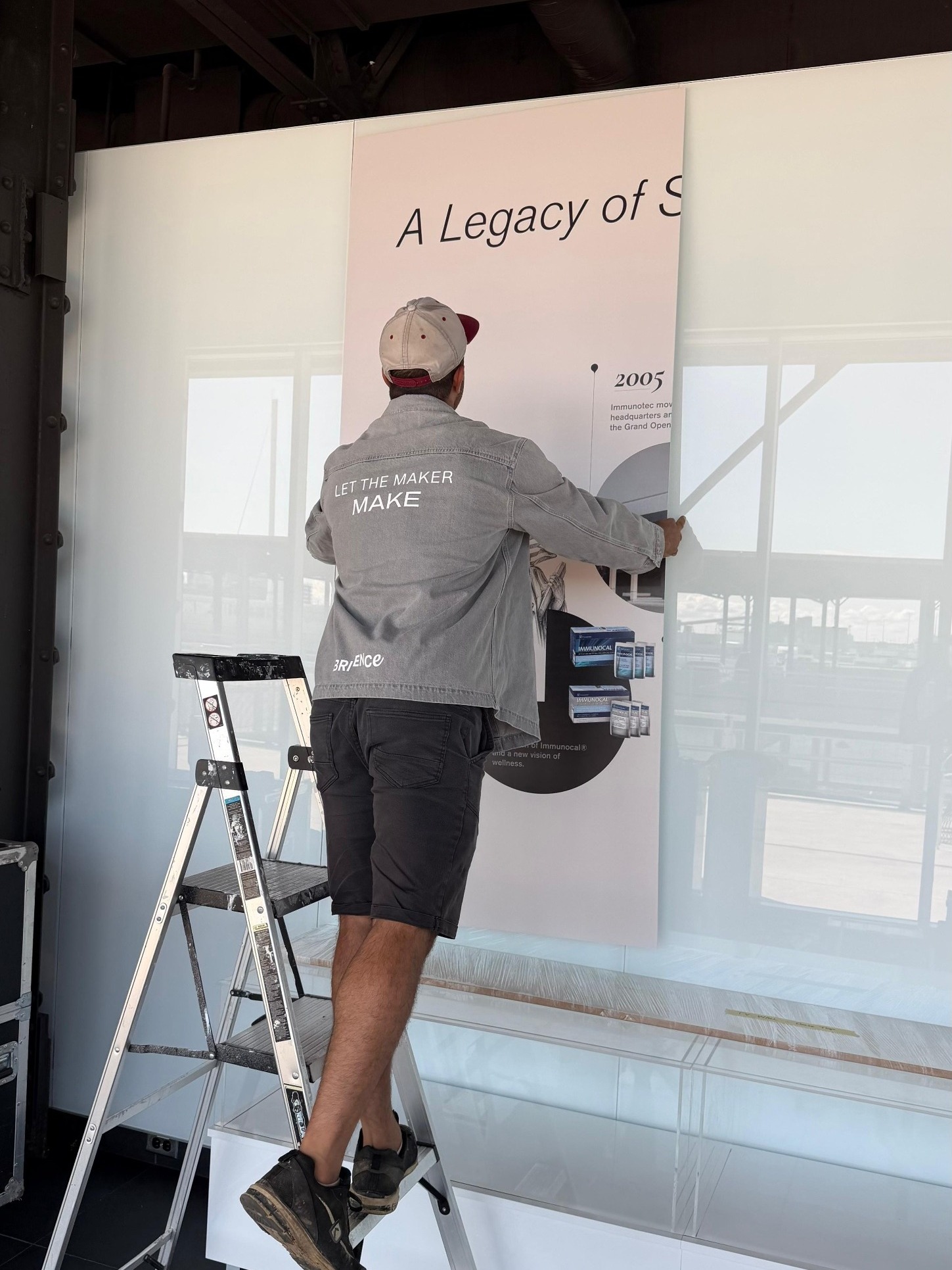Applying the timeline graphic on site in Montreal