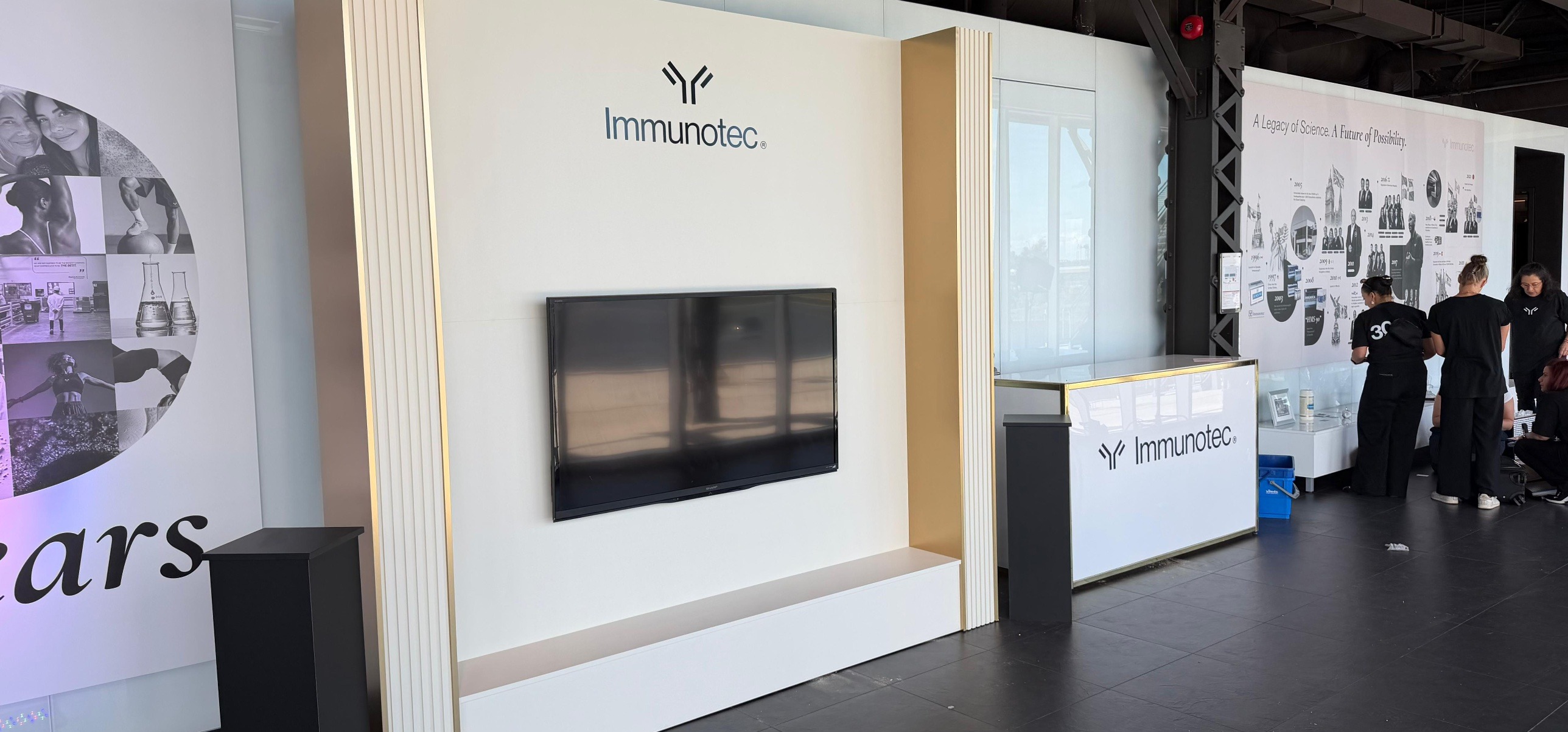 The finished TV wall and timeline wall on site at the Immunotec 30th Anniversary Gala, Montreal