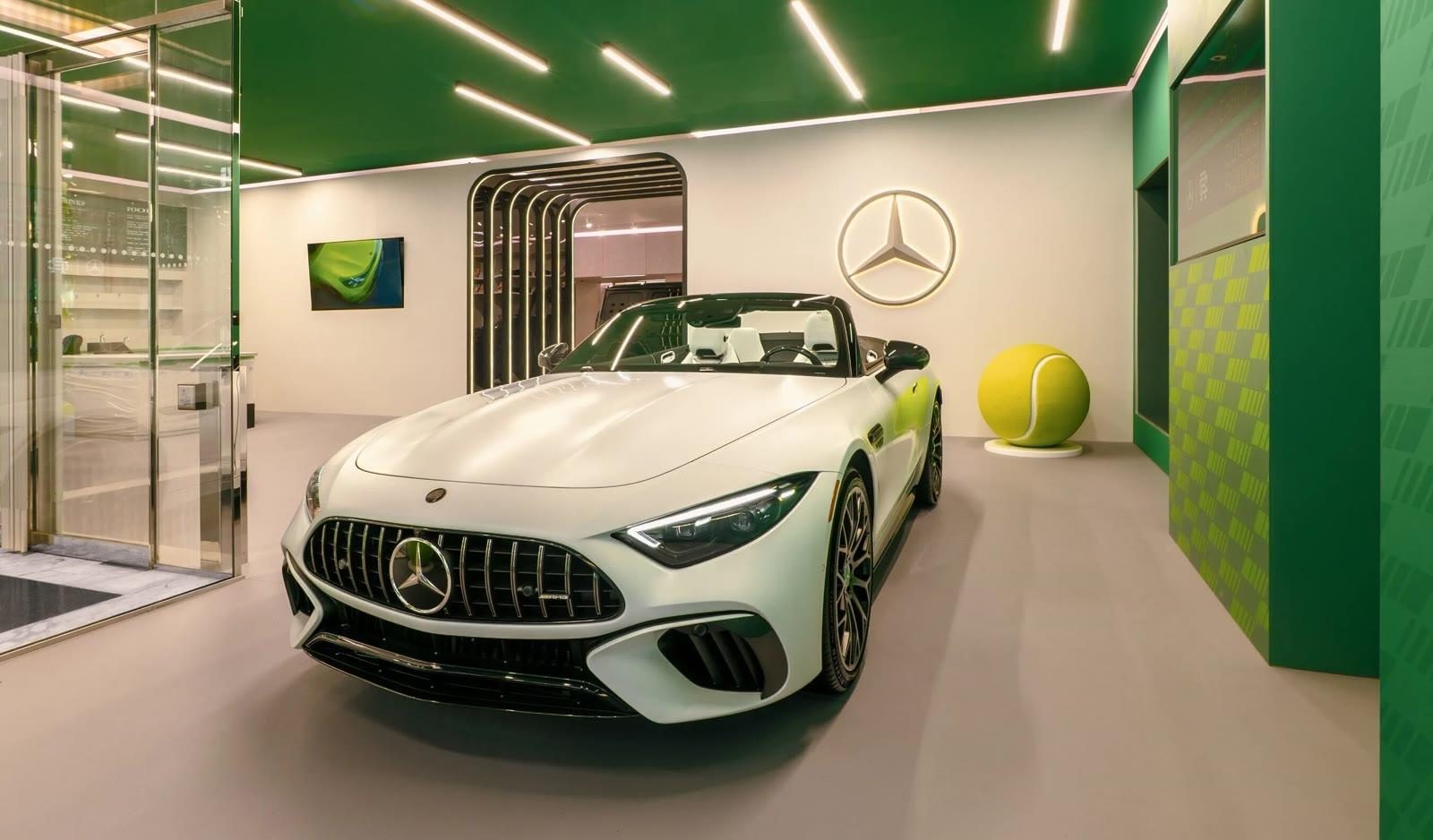 Inside: an AMG SL under the tennis-green ceiling, Mercedes-Benz Studio Toronto, Holt Renfrew Yorkville