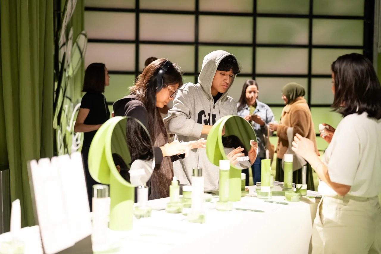 Beauty brand pop-up fabrication with scent diffusion and tactile product displays, single-ingredient activation design